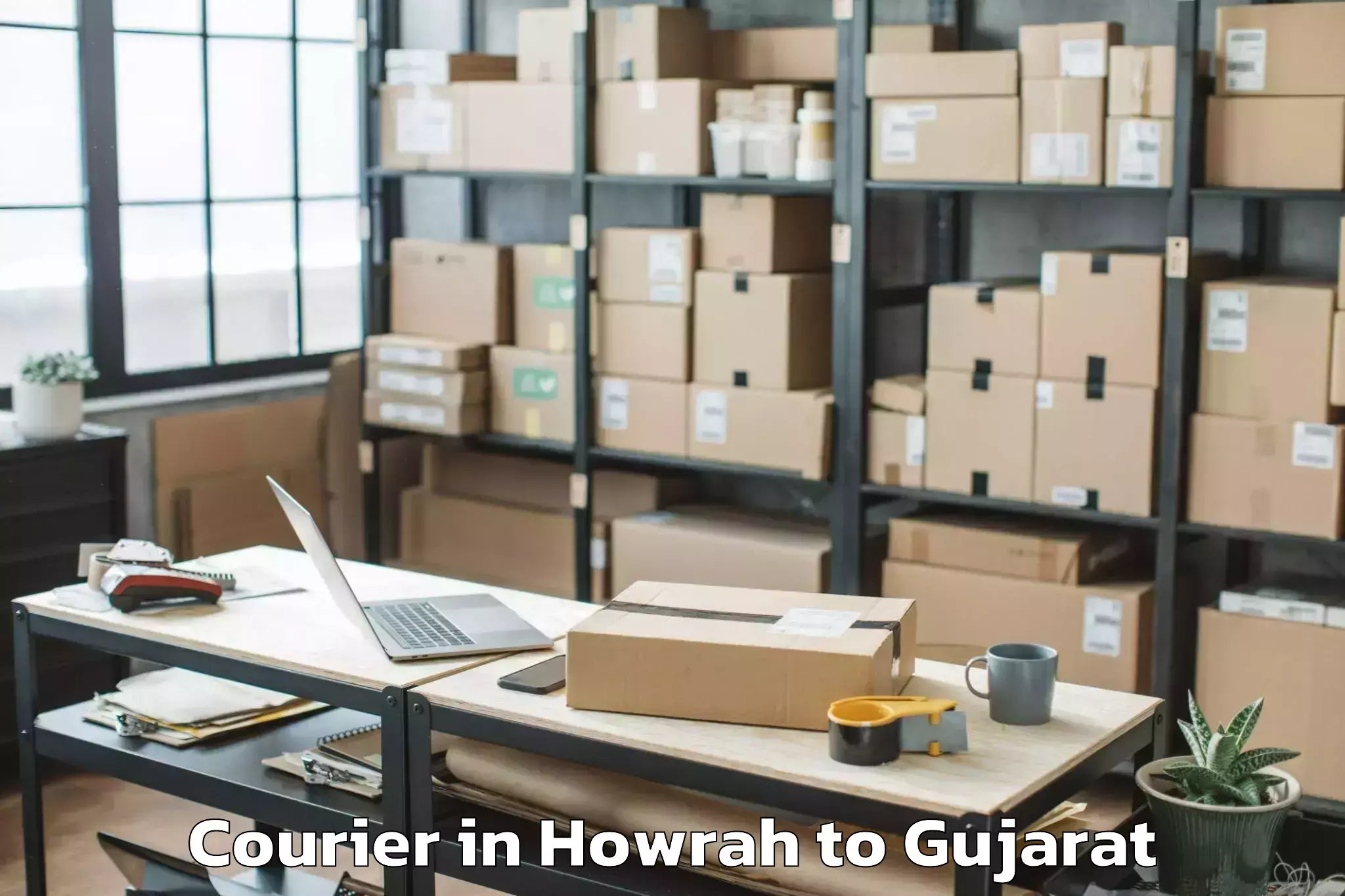 Trusted Howrah to Kutiyana Courier